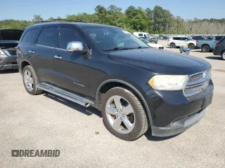 2012 Dodge Durango Citadel z VIN 1C4RDJEG3CC301467, wystawiony jako Copart lot #52531575 z przebiegiem 270 719 mil mil oraz Szkody całkowita. Historia ofert i sprzedaży dostępna na DreamBid. Obrazek 4.