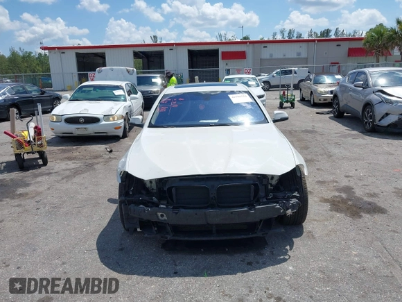 2014 BMW 5 Series 535i xDrive with VIN WBA5B3C56ED536747, listed as a IAAI auction lot 41900220 with 132,757 mi miles and . Bid and sale history available at carsss.com. Image 13.