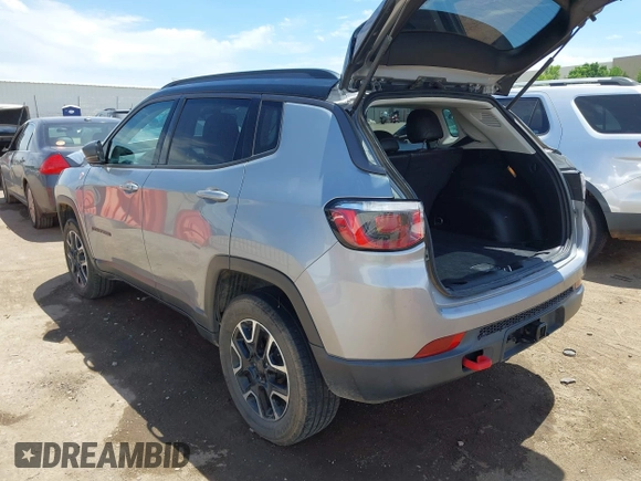 2020 Jeep Compass Trailhawk with VIN 3C4NJDDB7LT159532, listed as a IAAI auction lot 42243833 with 118,566 mi miles and . Bid and sale history available at DreamBid. Image 3.