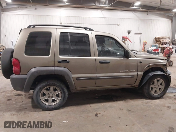 2003 Jeep Liberty Sport with VIN 1J4GL48K83W652993, listed as a IAAI auction lot 41086140 with 115,177 mi miles and . Bid and sale history available at DreamBid. Image 13.