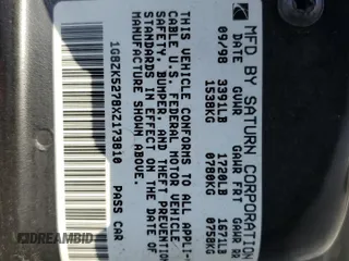 1999 Saturn SL z VIN 1G8ZK5278XZ173810, wystawiony jako Copart lot #42571425 z przebiegiem 114 580 mil mil oraz Szkoda całkowita • Salvage title. Historia ofert i sprzedaży dostępna na DreamBid. Obrazek 14.