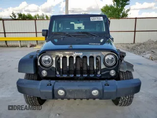 2015 Jeep Wrangler Freedom Edition with VIN 1C4AJWAG8FL541675, listed as a Copart auction lot 62647855 with 53,915 mi miles and Salvage title. Bid and sale history available at DreamBid. Image 5.