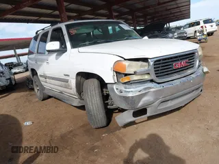 2003 GMC Yukon SLT z VIN 1GKEC13T33R271440, wystawiony jako IAAI lot #41937382 z przebiegiem 231 077 mil mil oraz . Historia ofert i sprzedaży dostępna na DreamBid. Obrazek 1.