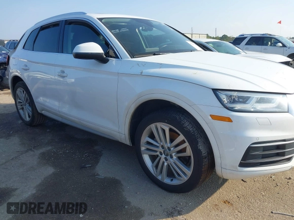 2018 Audi Q5 Premium Plus with VIN WA1BNAFY1J2220714, listed as a IAAI auction lot 41209386 with 70,012 mi miles and . Bid and sale history available at DreamBid. Image 1.