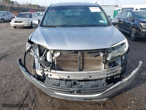 2018 Honda Pilot EX-L with VIN 5FNYF6H59JB026068, listed as a IAAI auction lot 41458049 with 128,769 mi miles. Bid and sale history available at carsss.com. Image 12.