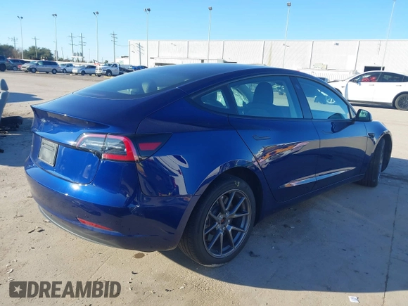 2023 Tesla Model 3 with VIN 5YJ3E1EA6PF505252, listed as a IAAI auction lot 41380172 with 31,141 mi miles and . Bid and sale history available at DreamBid. Image 4.