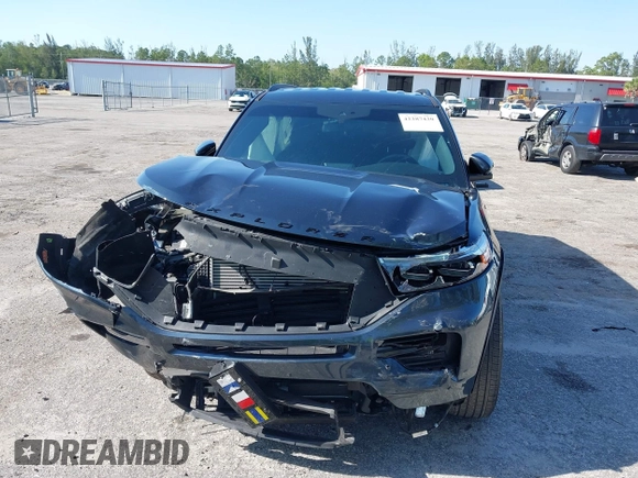 2022 Ford Explorer ST-Line z VIN 1FMSK7KH9NGB68860, wystawiony jako IAAI lot #42287420 z przebiegiem 25 579 mil mil oraz . Historia ofert i sprzedaży dostępna na DreamBid. Obrazek 13.