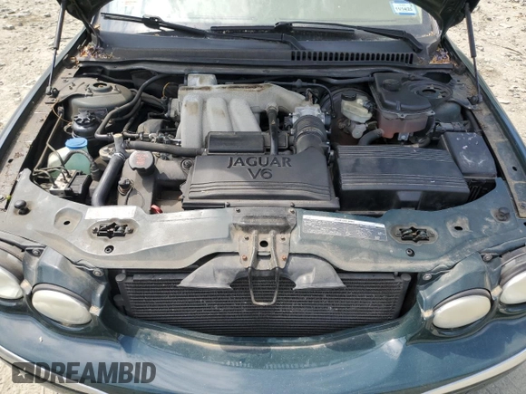 2004 Jaguar X-Type with VIN SAJEA51C64WE17722, listed as a Copart auction lot 55416405 with 89,047 mi miles and Salvage Title. Bid and sale history available at DreamBid. Image 11.