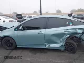 2022 Toyota Prius L Eco with VIN JTDKAMFU9N3186859, listed as a IAAI auction lot 41486941 with 122,665 mi miles and . Bid and sale history available at DreamBid. Image 14.