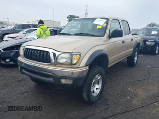 2001 Toyota Tacoma PreRunner with VIN 5TEGN92N11Z856759, listed as a IAAI auction lot 41716511 with 400,627 mi miles and . Bid and sale history available at DreamBid. Image 2.