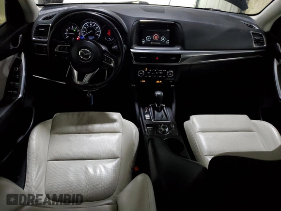 2016 Mazda CX-5 Grand Touring with VIN JM3KE4DY2G0738899, listed as a Copart auction lot 50943255 with 80,807 mi miles and Salvage Title. Bid and sale history available at carsss.com. Image 8.