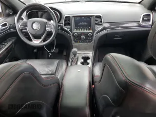 2018 Jeep Grand Cherokee Trailhawk with VIN 1C4RJFLG1JC264781, listed as a Copart auction lot 61524135 with 82,786 mi miles and Salvage title. Bid and sale history available at DreamBid. Image 8.