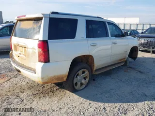 2015 Chevrolet Tahoe LTZ with VIN 1GNSCCKCXFR287609, listed as a IAAI auction lot 41688936 with 112,678 mi miles. Bid and sale history available at carsss.com. Image 4.