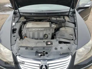 2006 Acura RL with VIN JH4KB16576C003138, listed as a Copart auction lot 52933995 with 176,906 mi miles and Salvage Title. Bid and sale history available at DreamBid. Image 11.