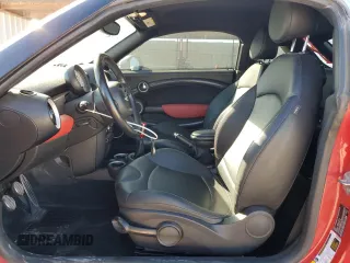 2012 MINI Coupe S z VIN WMWSX3C56CT408371, wystawiony jako Copart lot #73730514 z przebiegiem 95 786 mil mil oraz Szkody całkowita. Historia ofert i sprzedaży dostępna na DreamBid. Obrazek 7.