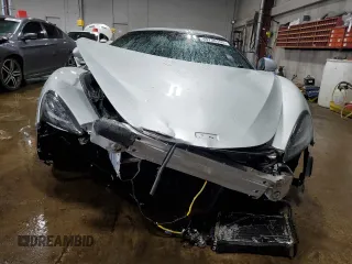 2018 McLaren 570S z VIN SBM13FAA2JW004594, wystawiony jako Copart lot #49730155 z przebiegiem Nie podano mil oraz Szkody całkowita. Historia ofert i sprzedaży dostępna na DreamBid. Obrazek 5.