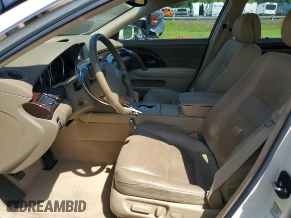 2006 Acura RL z VIN JH4KB16576C012132, wystawiony jako Copart lot #61897805 z przebiegiem 143 101 mil mil oraz Szkoda całkowita • Salvage title. Historia ofert i sprzedaży dostępna na DreamBid. Obrazek 7.
