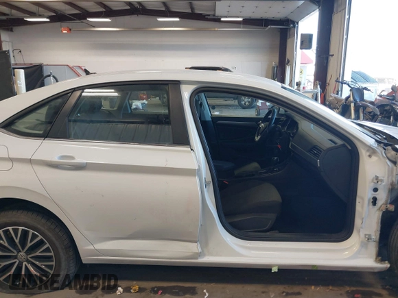 2021 Volkswagen Jetta S z VIN 3VWC57BU5MM046236, wystawiony jako IAAI lot #41740297 z przebiegiem 57 769 mil mil oraz . Historia ofert i sprzedaży dostępna na DreamBid. Obrazek 14.
