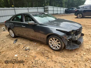 2014 Cadillac CTS RWD with VIN 1G6AP5SX7E0154156, listed as a Copart auction lot 62586325 with 83,818 mi miles and Salvage title. Bid and sale history available at DreamBid. Image 4.