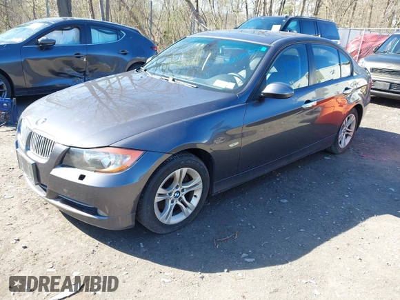2008 BMW 3 Series 328xi with VIN WBAVC93518K043073, listed as a IAAI auction lot 42134507 with 148,712 mi miles. Bid and sale history available at carsss.com. Image 2.