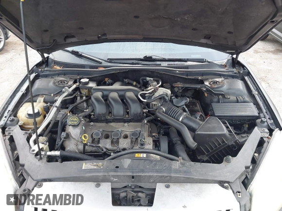 2006 Mercury Milan Premier with VIN 3MEHM08106R604501, listed as a IAAI auction lot 41565575 with 192,699 mi miles and . Bid and sale history available at DreamBid. Image 10.
