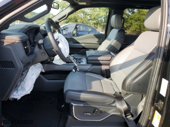 2024 Ford F-150 Lightning LARIAT with VIN 1FT6W5L73RWG03162, listed as a Copart auction lot 71613234 with 1,651 mi miles and Salvage Title. Bid and sale history available at carsss.com. Image 7.