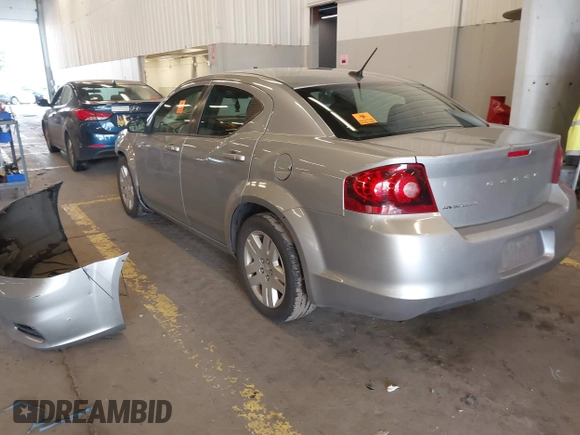 2014 Dodge Avenger SE with VIN 1C3CDZAB4EN161536, listed as a IAAI auction lot 41604009 with 107,957 mi miles. Bid and sale history available at carsss.com. Image 3.