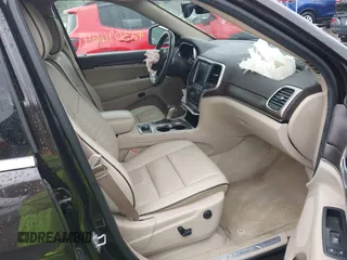 2017 Jeep Grand Cherokee Overland z VIN 1C4RJFCG7HC800403, wystawiony jako IAAI lot #42309664 z przebiegiem 98 389 mil mil oraz . Historia ofert i sprzedaży dostępna na DreamBid. Obrazek 5.