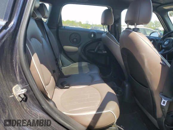 2015 MINI Countryman S with VIN WMWZC3C52FWT05882, listed as a Copart auction lot 54399525 with 125,971 mi miles and Salvage title. Bid and sale history available at DreamBid. Image 11.