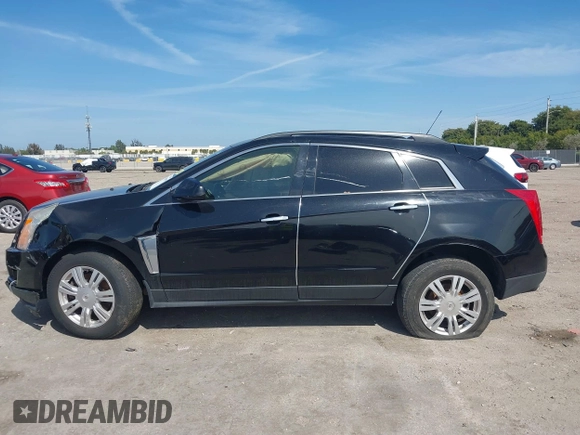 2015 Cadillac SRX with VIN 3GYFNAE33FS522380, listed as a IAAI auction lot 41641899 with 193,818 mi miles and . Bid and sale history available at DreamBid. Image 15.