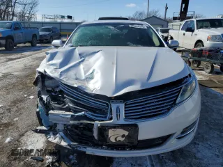 2015 Lincoln MKZ z VIN 3LN6L2GK8FR627120, wystawiony jako Copart lot #45954315 z przebiegiem 103 930 mil mil oraz Szkoda całkowita • Salvage title. Historia ofert i sprzedaży dostępna na DreamBid. Obrazek 5.