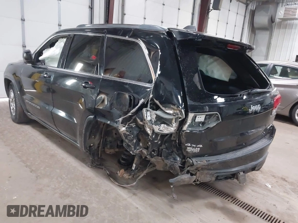 2017 Jeep Grand Cherokee Laredo with VIN 1C4RJFAG2HC625111, listed as a IAAI auction lot 42044571 with 148,533 mi miles and . Bid and sale history available at DreamBid. Image 3.