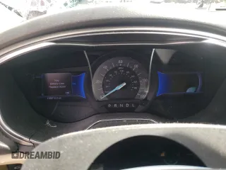 2013 Ford Fusion SE Hybrid z VIN 3FA6P0LU7DR197801, wystawiony jako Copart lot #60468095 z przebiegiem 169 215 mil mil oraz Szkoda całkowita • Salvage title. Historia ofert i sprzedaży dostępna na DreamBid. Obrazek 9.