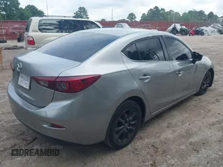 2016 Mazda 3 i Sport with VIN JM1BM1U77G1284645, listed as a IAAI auction lot 42101635 with 178,489 mi miles and . Bid and sale history available at DreamBid. Image 4.