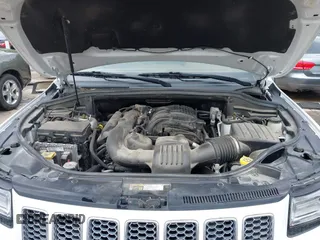 2015 Jeep Grand Cherokee Summit with VIN 1C4RJFJG5FC104087, listed as a IAAI auction lot 42100298 with 88,710 mi miles and . Bid and sale history available at DreamBid. Image 10.