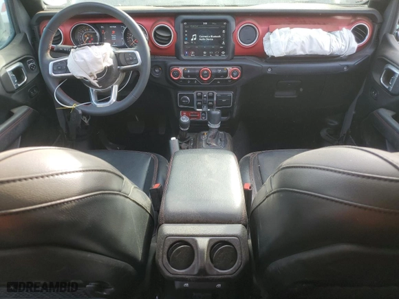 2023 Jeep Gladiator Rubicon with VIN 1C6JJTBG4PL562478, listed as a Copart auction lot 80334094 with 14,053 mi miles and Salvage Title. Bid and sale history available at carsss.com. Image 8.