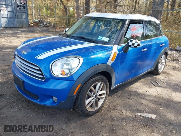 2014 MINI Countryman with VIN WMWZB3C59EWR37439, listed as a IAAI auction lot 42110149 with 181,661 mi miles and . Bid and sale history available at DreamBid. Image 2.