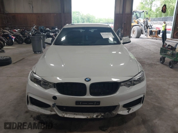 2014 BMW 4 Series 435i xDrive with VIN WBA3R5C54EK186187, listed as a IAAI auction lot 42248064 with 73,532 mi miles and . Bid and sale history available at DreamBid. Image 12.