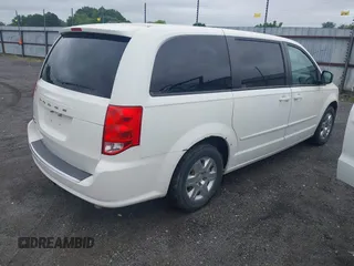 2012 Dodge Grand Caravan SE with VIN 2C4RDGBG8CR115003, listed as a IAAI auction lot 42217153 with 196,833 mi miles and . Bid and sale history available at DreamBid. Image 4.