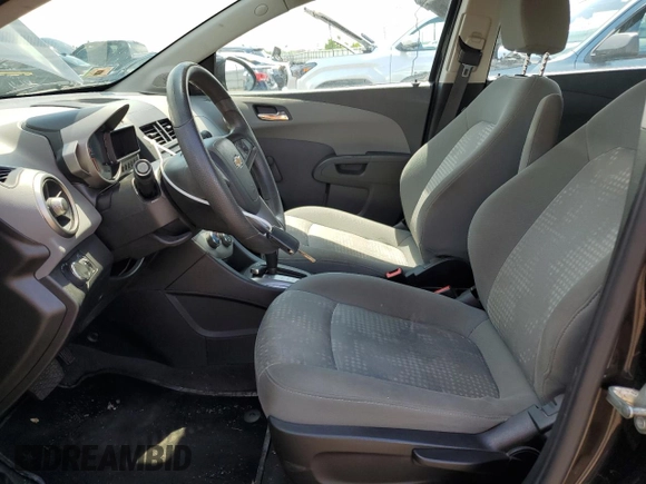 2014 Chevrolet Sonic LS with VIN 1G1JA5SH1E4241785, listed as a Copart auction lot 61914455 with 95,014 mi miles and Clean title. Bid and sale history available at DreamBid. Image 7.