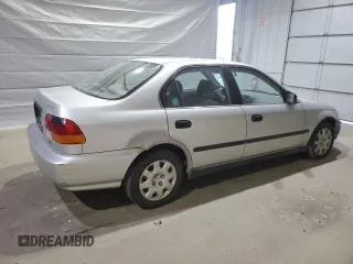 1998 Honda Civic LX with VIN 2HGEJ6675WH554442, listed as a Copart auction lot 53257865 with 104,597 mi miles and Clean Title. Bid and sale history available at DreamBid. Image 3.