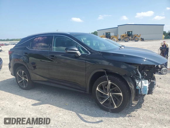 2016 Lexus RX 350 with VIN 2T2BZMCA9GC010001, listed as a Copart auction lot 66301085 with 116,091 mi miles and Salvage title. Bid and sale history available at DreamBid. Image 4.