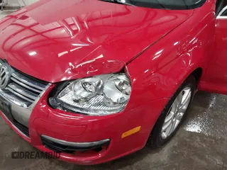 2010 Volkswagen Jetta TDI z VIN 3VWRL7AJ3AM178141, wystawiony jako IAAI lot #41467916 z przebiegiem 225 349 mil mil oraz . Historia ofert i sprzedaży dostępna na DreamBid. Obrazek 6.
