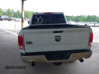 2014 Ram 1500 Longhorn z VIN 1C6RR6PT0ES129729, wystawiony jako IAAI lot #42018089 z przebiegiem 126 074 mil mil oraz . Historia ofert i sprzedaży dostępna na DreamBid. Obrazek 17.