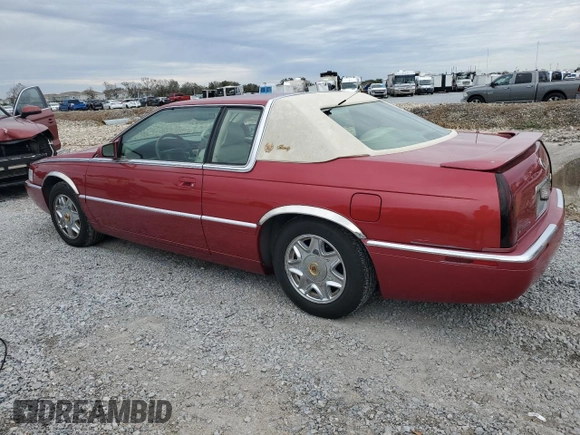 2001 Cadillac Eldorado ESC z VIN 1G6EL12Y11B103541, wystawiony jako Copart lot #45219055 z przebiegiem 46 179 mil mil oraz Tytuł czysty. Historia ofert i sprzedaży dostępna na DreamBid. Obrazek 2.