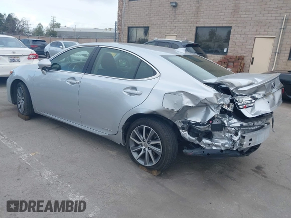 2016 Lexus ES 300h with VIN JTHBW1GG6G2118339, listed as a IAAI auction lot 41910352 with 73,184 mi miles and . Bid and sale history available at DreamBid. Image 3.