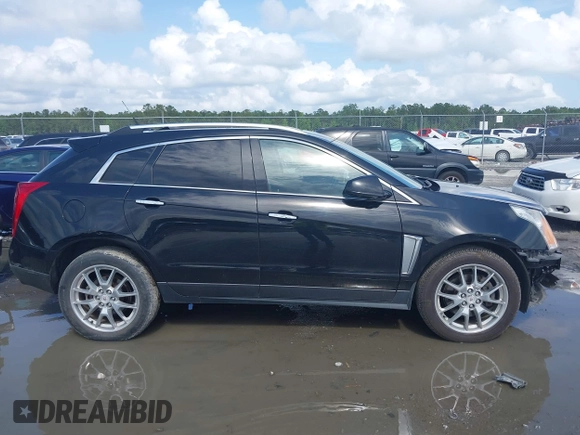 2014 Cadillac SRX Performance Collection с VIN 3GYFNFE38ES656510, выставлен на аукционе IAAI как лот 42336472 с пробегом 125 269 миль миль и . История ставок и продаж доступна на DreamBid. Изображение 13.