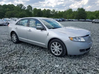 2012 Lincoln MKZ z VIN 3LNHL2GC4CR804632, wystawiony jako Copart lot #55783535 z przebiegiem 148 036 mil mil oraz Szkoda całkowita • Salvage title. Historia ofert i sprzedaży dostępna na DreamBid. Obrazek 4.