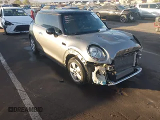 2017 MINI Hardtop Cooper with VIN WMWXP5C37H2G60453, listed as a IAAI auction lot 40903837 with 34,827 mi miles and . Bid and sale history available at DreamBid. Image 1.