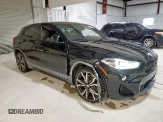 2018 BMW X2 sDrive28i with VIN WBXYJ3C37JEJ81760, listed as a Copart auction lot 54973475 with 64,000 mi miles and Clean title. Bid and sale history available at DreamBid. Image 4.